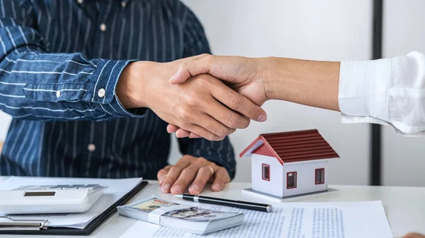 Real estate agent with clients